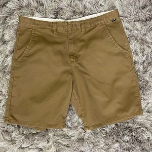 Vans men tan zipper and button front closure,  pocketed shorts. Size 36. Used.